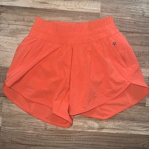 Lululemon size 2 tracker short 4” burnt orange